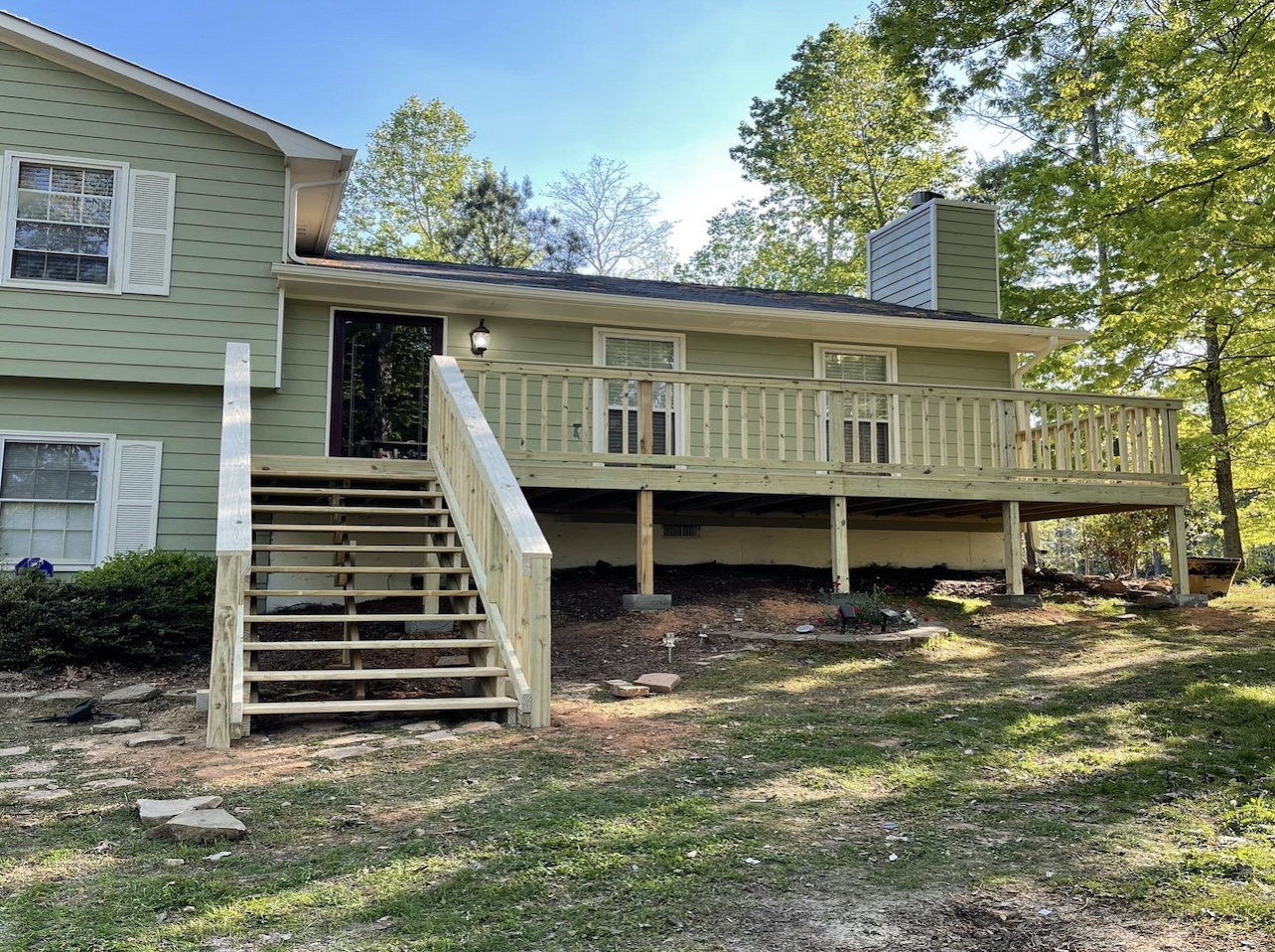 Wooden Porch with staircase and fence