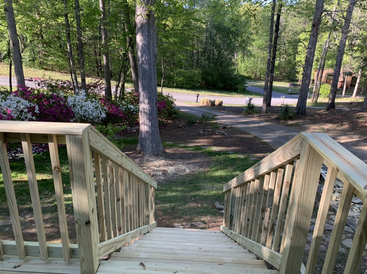 Wooden staircase leafing to lawn 